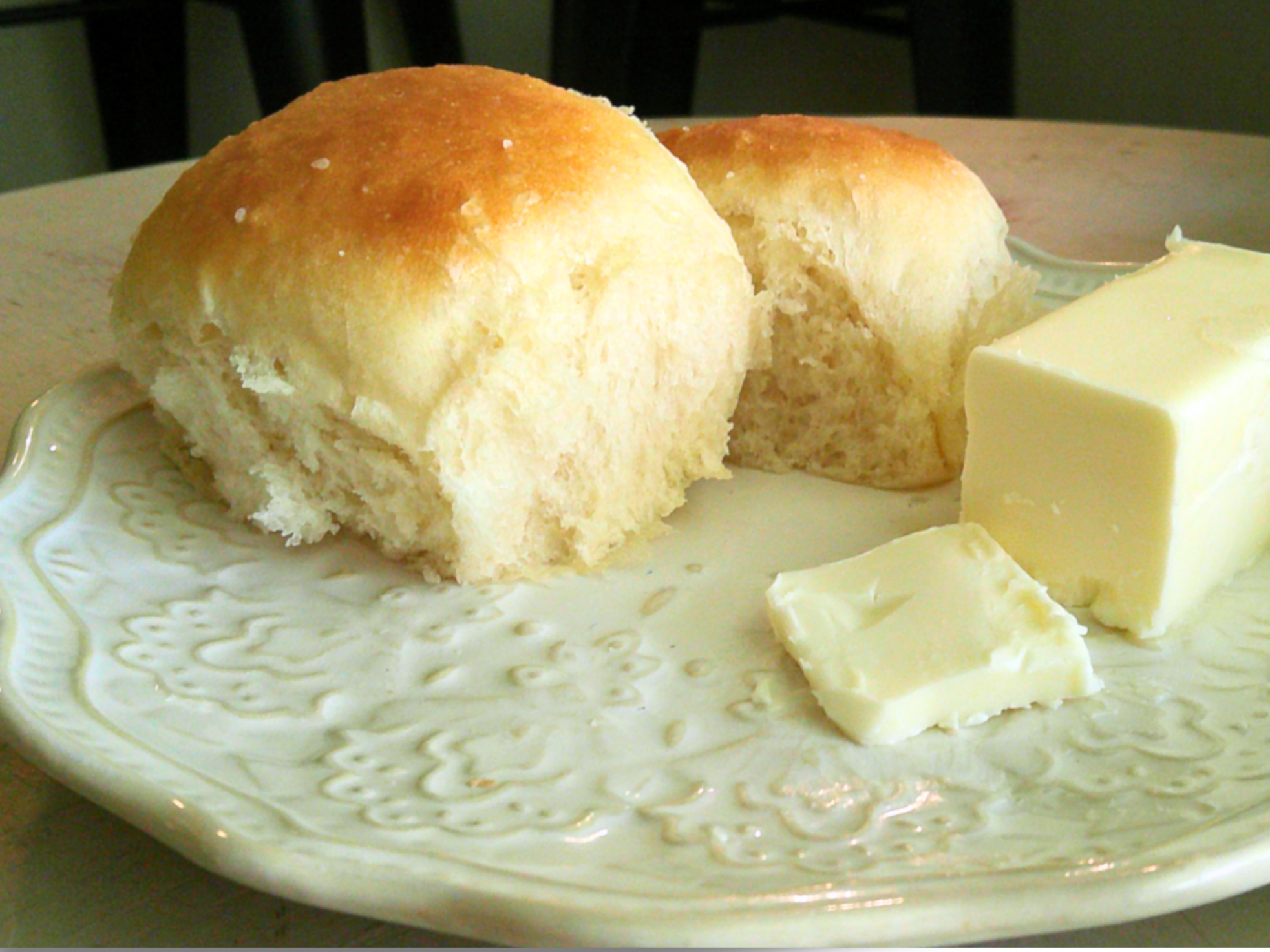 dinner roll on a white plate